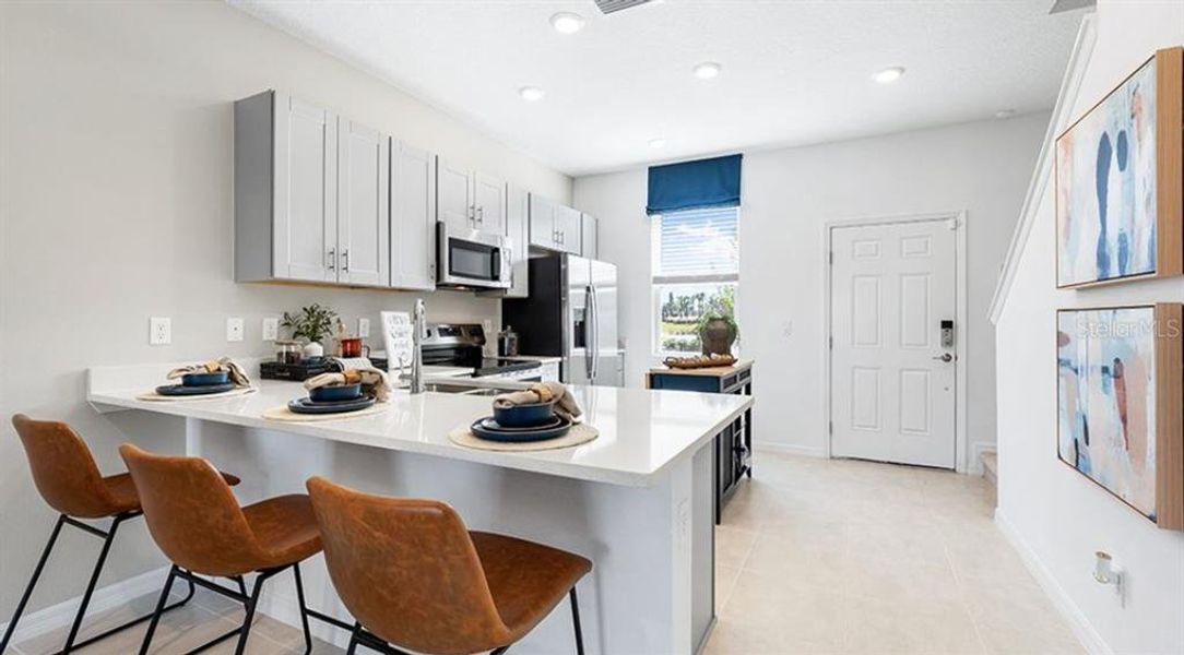 Furnished interior view inside a new home in The Townhomes at Westview, Kissimmee (Image 18).