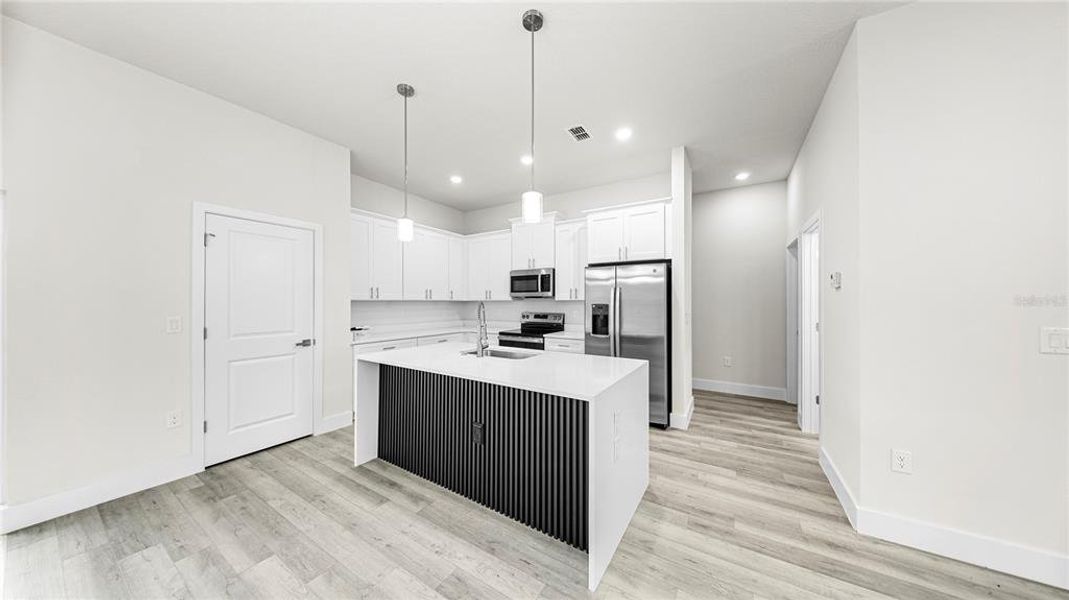 Furnished interior view inside a new home in , Port Charlotte (Image 6).