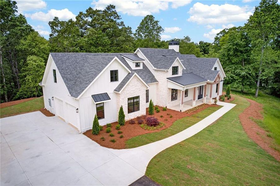 Front exterior of a new home in , Ellijay, GA, highlighting curb appeal (Image 2). Front exterior of a new home in , Ellijay, GA, highlighting curb appeal (Image 2).