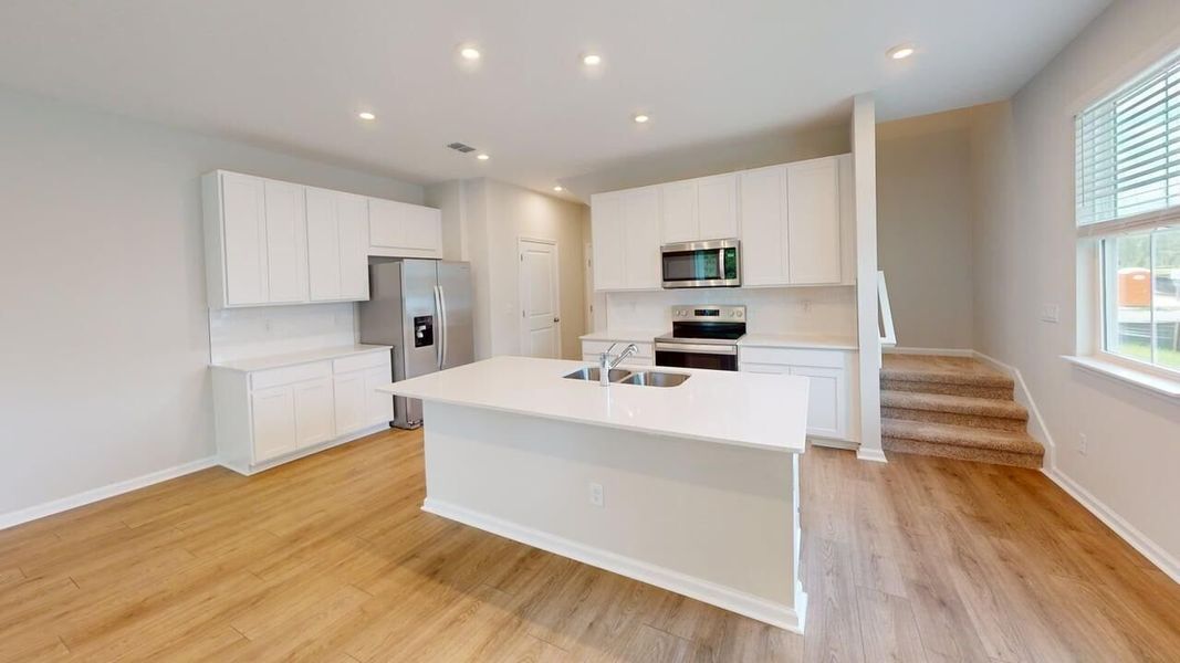 Furnished interior view inside a new home in RiverTown, St. Johns (Image 4).