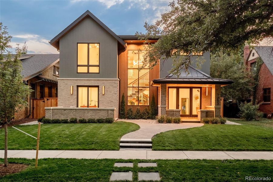 Front exterior of a new home in , Denver, CO, highlighting curb appeal (Image 19).