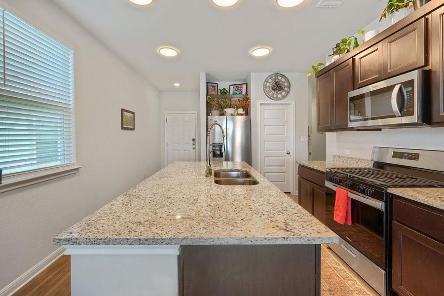 Furnished interior view inside a new home in Stallion Run, Buda (Image 16).