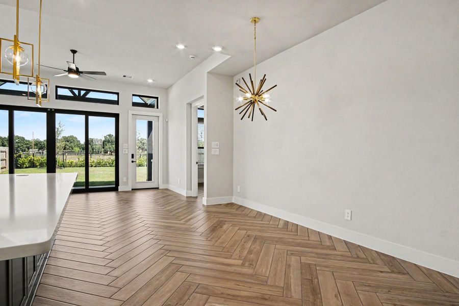 Breakfast area leading to great room. Breakfast area leading to great room.