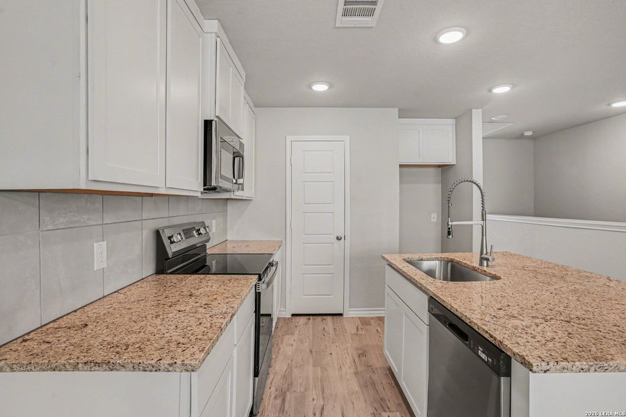 Furnished interior view inside a new home in , San Antonio (Image 7).