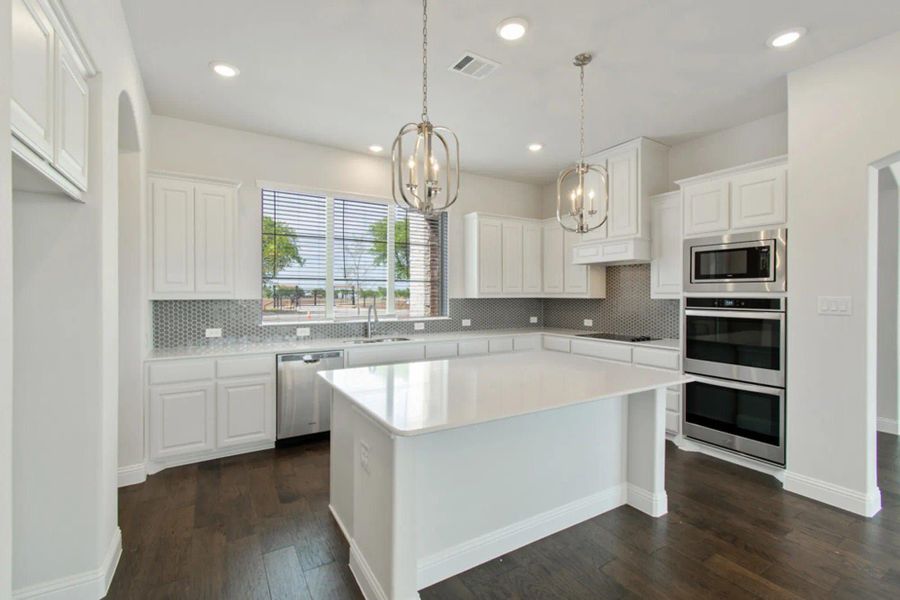 Kitchen | Concept 2797 at Hidden Creek Estates in Van Alstyne, TX by Landsea Homes