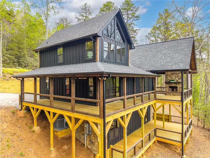Exterior details and patio area of a home in , Mineral Bluff (Image 24).