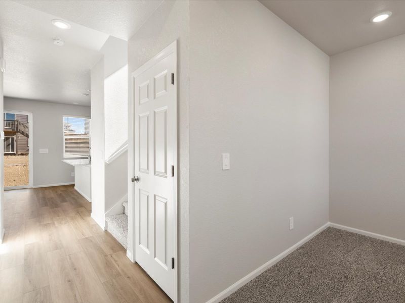Spacious, unfurnished interior of a new home in Buffalo Highlands: The Flora Collection, Commerce City (Image 8). Spacious, unfurnished interior of a new home in Buffalo Highlands: The Flora Collection, Commerce City (Image 8).