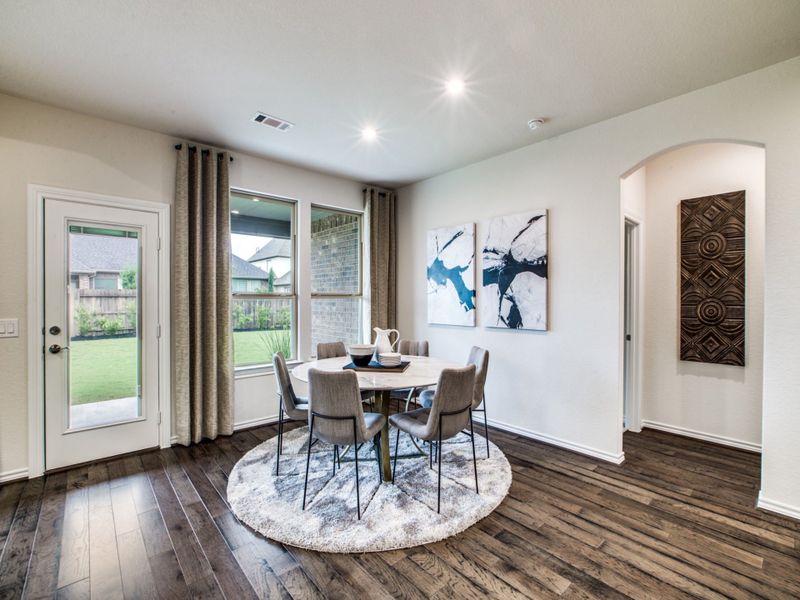 Dining area off kitchen with access to backyard