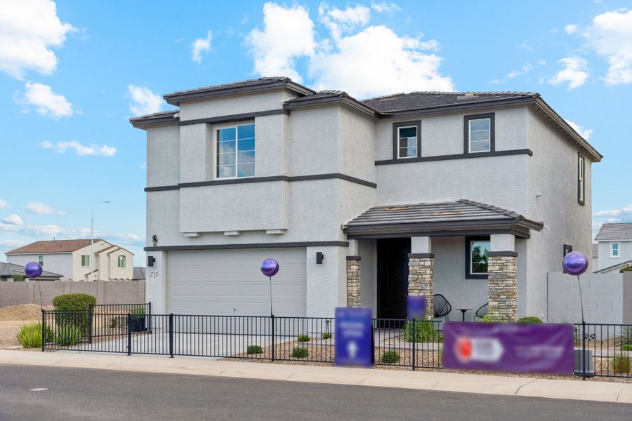 A house with a fence around it.