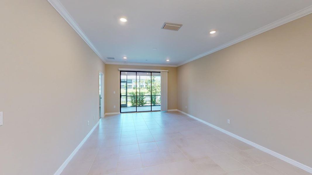 Representative unfurnished interior of a home built from the Caserta VII by Taylor Morrison in Esplanade at Rivergrass Condos, Naples (Image 3).
