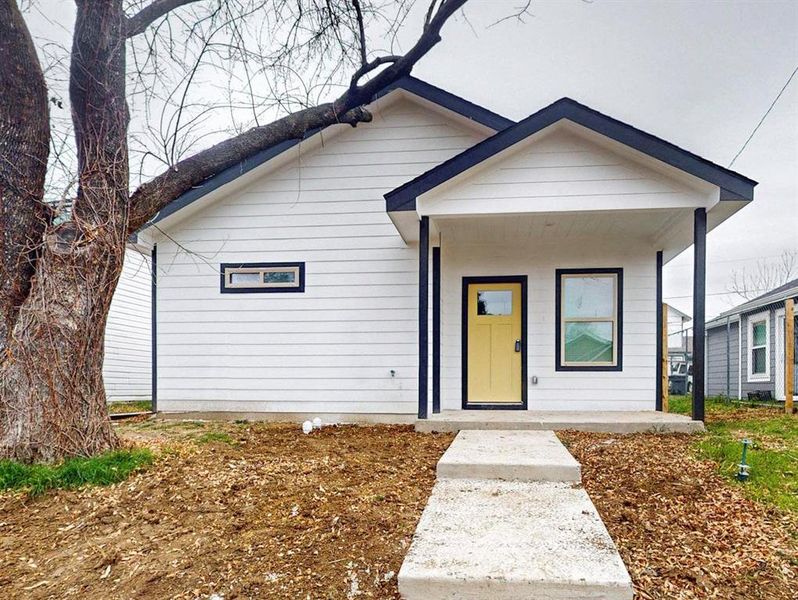 Front exterior of a new home in , Dallas, TX, highlighting curb appeal (Image 18).