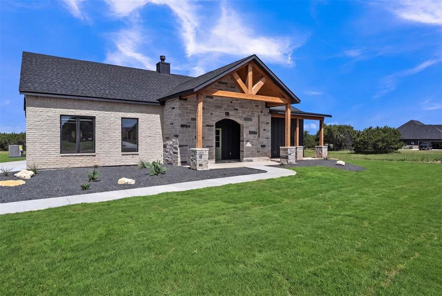 Front exterior of a new home in , Rio Vista, TX, highlighting curb appeal (Image 17).