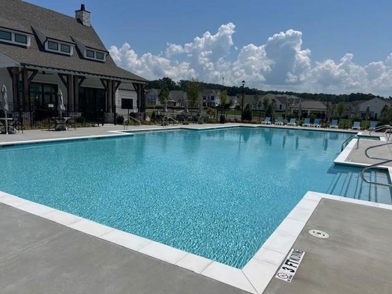 Front exterior of a new home in Promenade at Sawnee Village, Cumming, GA, highlighting curb appeal (Image 28).