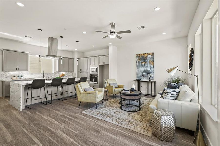 Spacious and inviting living area adorned with stylish vinyl 20mm flooring. The perfect space for relaxation and entertaining guests