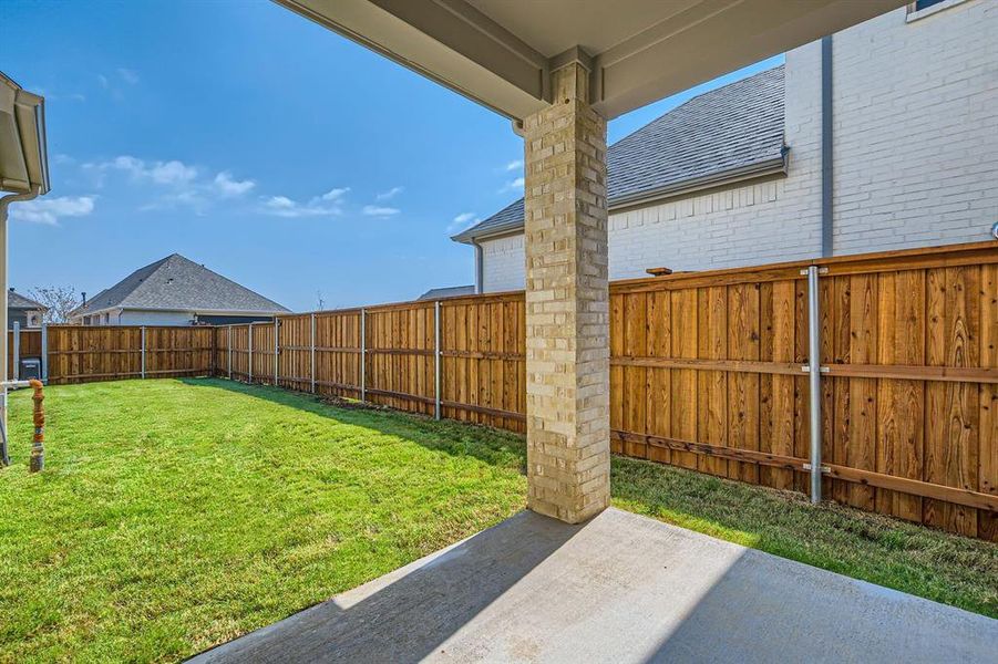 View of yard with a patio