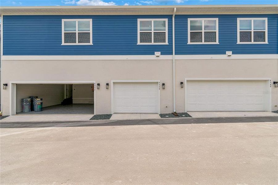 Front exterior of a new home in , Orlando, FL, highlighting curb appeal (Image 21).