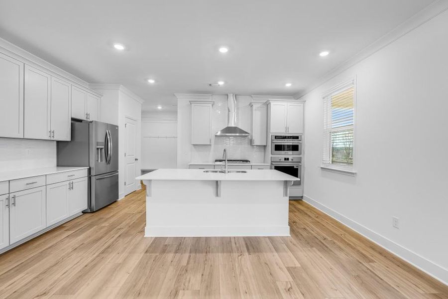 Furnished interior view inside a new home in Wellington Estates, Madison (Image 6).