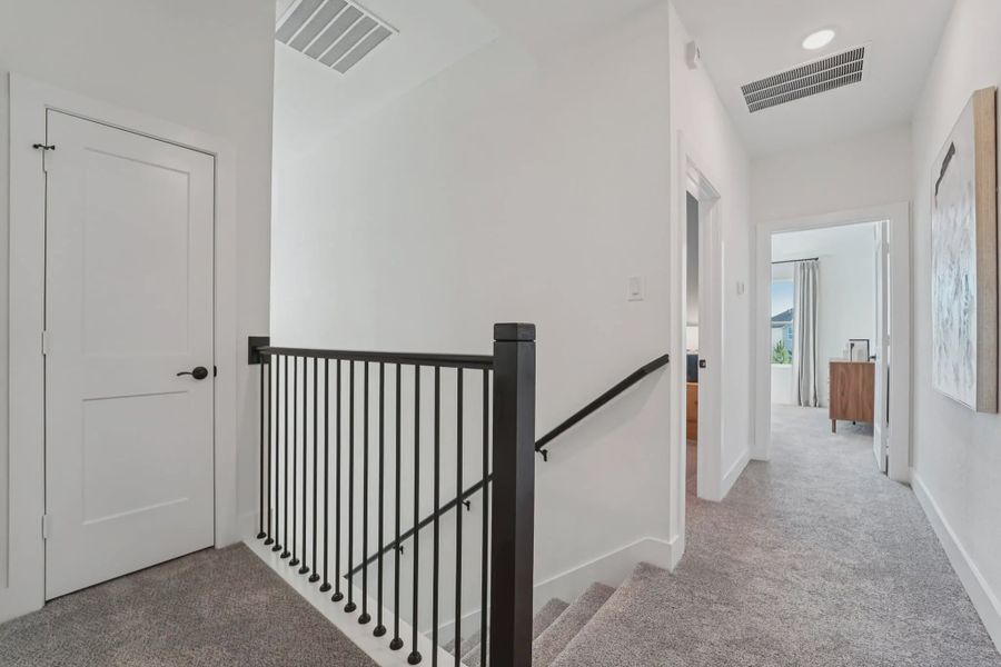 Representative unfurnished interior of a home built from the Versailles by Chesmar Homes in Bridgeland Chateau, Cypress (Image 18).