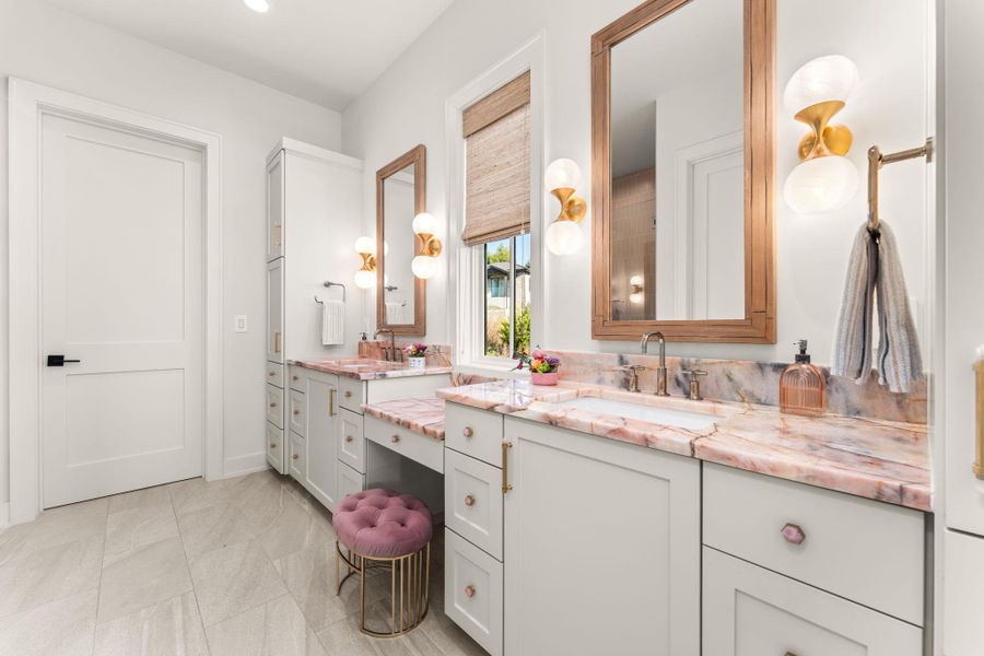 Bathroom featuring double vanity Bathroom featuring double vanity