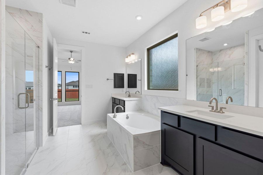Primary Bath retreat with dual vanities & garden tub