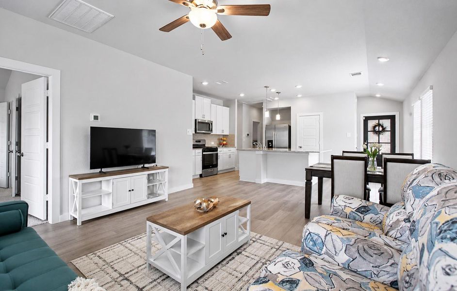The living area is open to the kitchen making entertaining with family and friends relaxing and enjoyable. The living area is open to the kitchen making entertaining with family and friends relaxing and enjoyable.