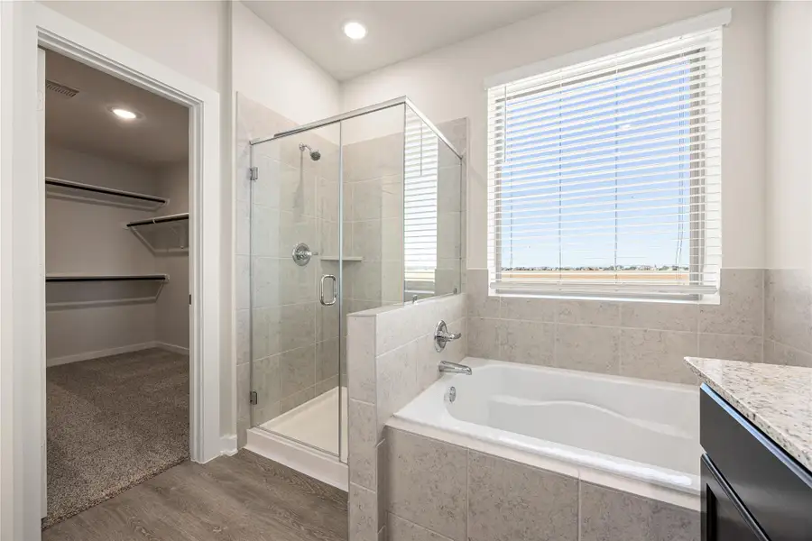 The en-suite bathroom features a clean, modern design with ample space and thoughtful finishes, creating a relaxing and functional retreat. The en-suite bathroom features a clean, modern design with ample space and thoughtful finishes, creating a relaxing and functional retreat.