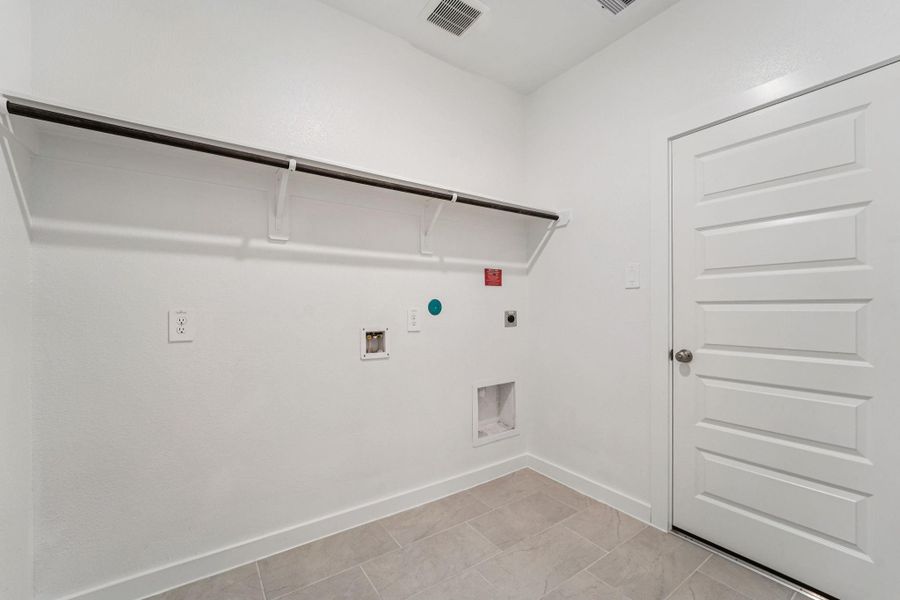 Photo is not of the actual home, but is an inspirational photo of builder’s model home and may depict options, furnishings, and/or decorator features that are not included