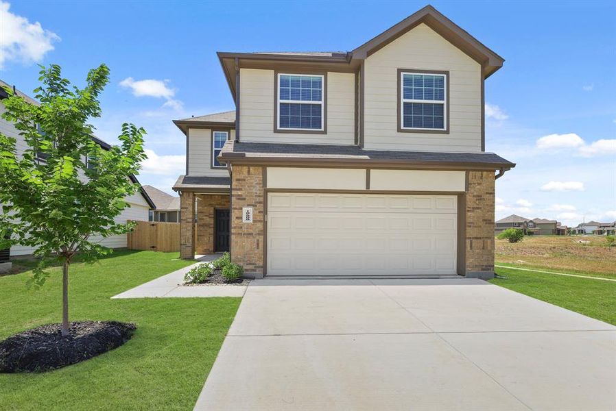Front exterior of a new home in Deer Creek, Fort Worth, TX, highlighting curb appeal (Image 1). Front exterior of a new home in Deer Creek, Fort Worth, TX, highlighting curb appeal (Image 1).