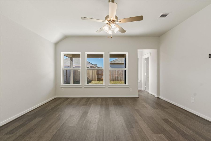 Spacious, unfurnished interior of a new home in Sunterra, Katy (Image 30).