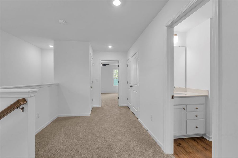 This bright hallway offers easy flow and comfortab This bright hallway offers easy flow and comfortab