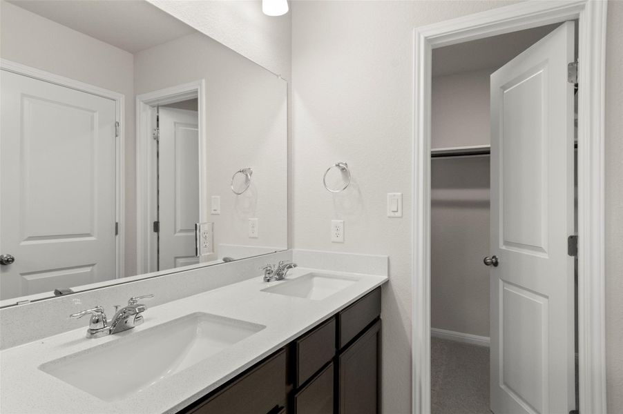 Full bathroom with double vanity