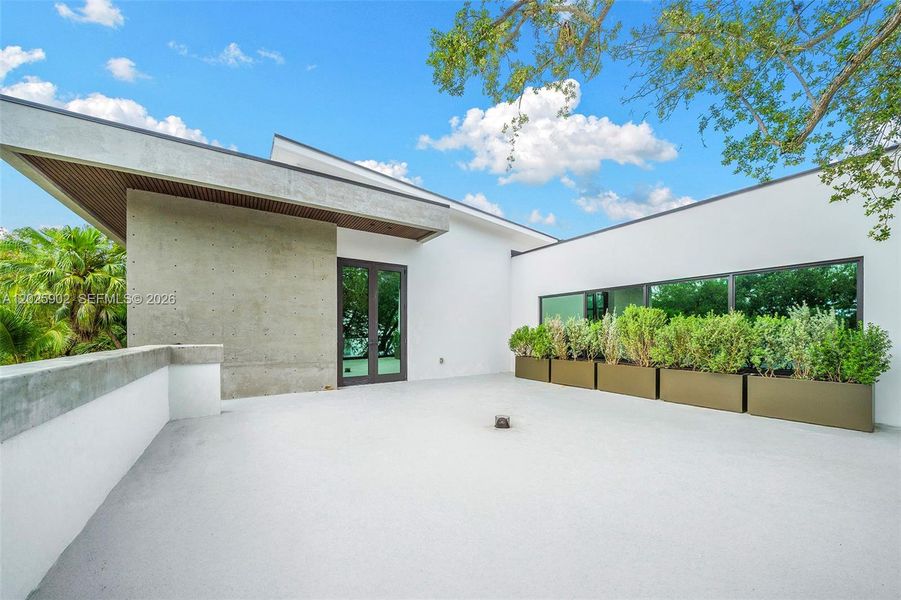 Exterior details and patio area of a home in , Miami (Image 24). Exterior details and patio area of a home in , Miami (Image 24).