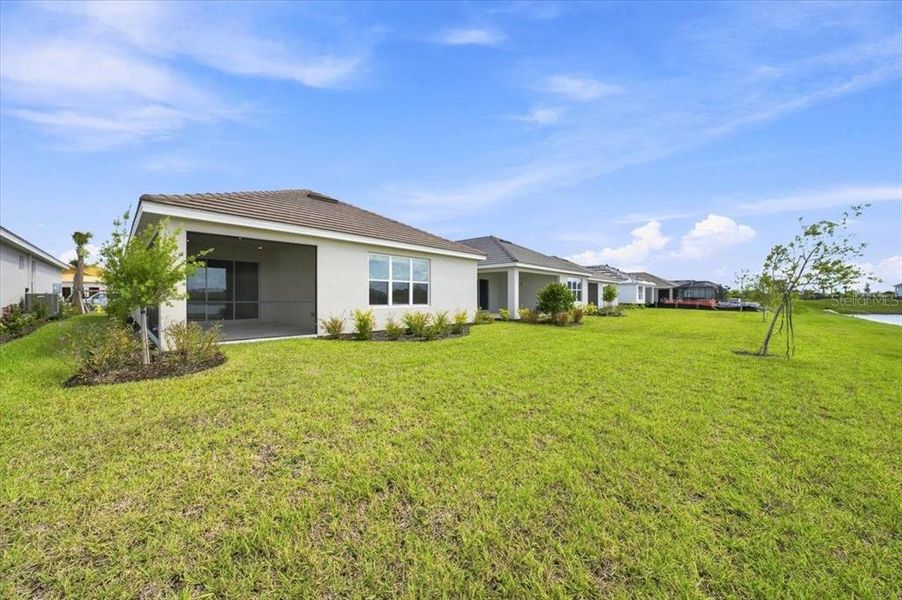 Exterior details and patio area of a home in Coasterra Community Group Page, Palmetto (Image 25).