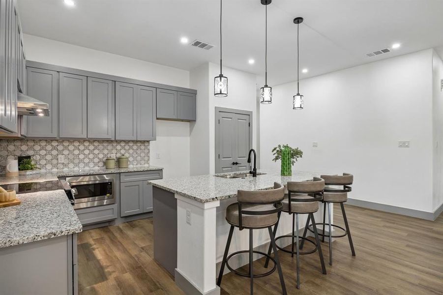 Another view of the kitchen and you can see the hallway to the front entry.