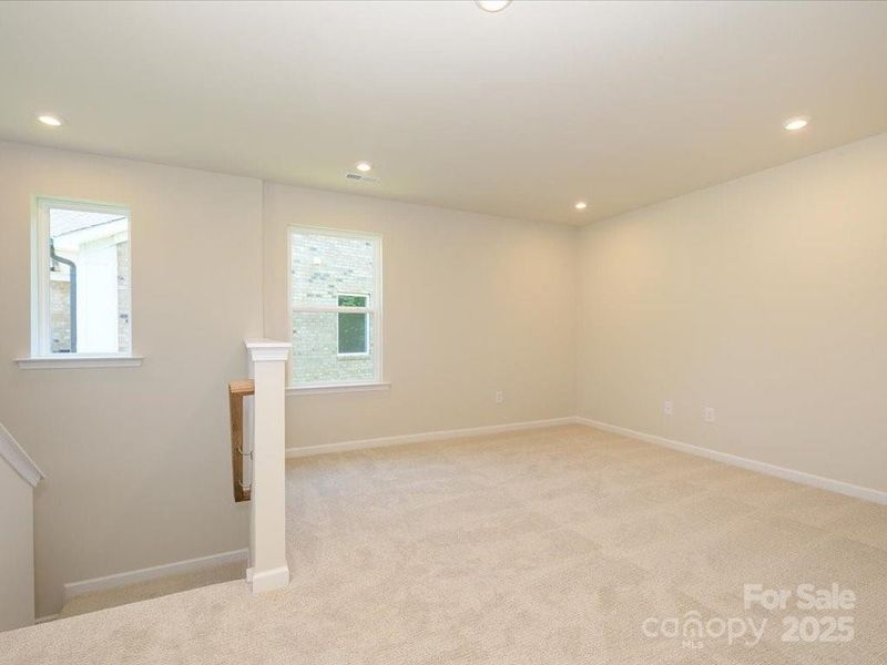 Transform this loft space into whatever you need. Extra lounge area, home office, gym, or library. Transform this loft space into whatever you need. Extra lounge area, home office, gym, or library.