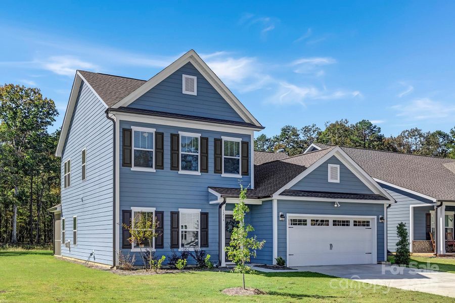 Front exterior of a new home in Stonebridge Fairways, Monroe, NC, highlighting curb appeal (Image 27).