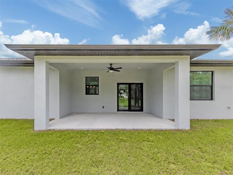 Exterior details and patio area of a home in , North Port (Image 24).