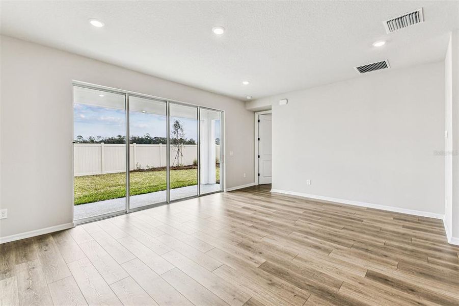 Spacious, unfurnished interior of a new home in Oakfield at Mount Dora Village Series, Mount Dora (Image 42).
