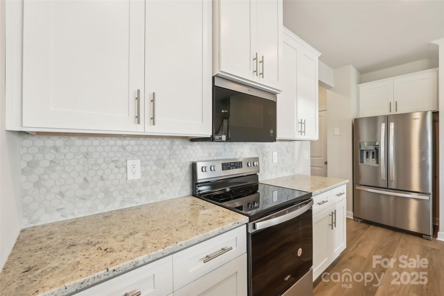 Furnished interior view inside a new home in Walnut Reserve, Conover (Image 5).