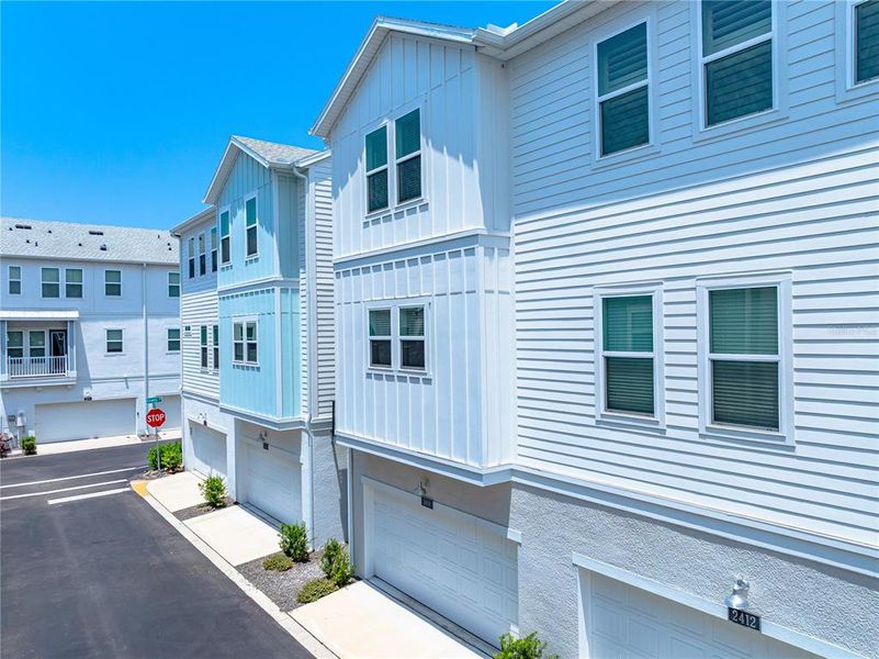 Front exterior of a new home in , Sarasota, FL, highlighting curb appeal (Image 23).