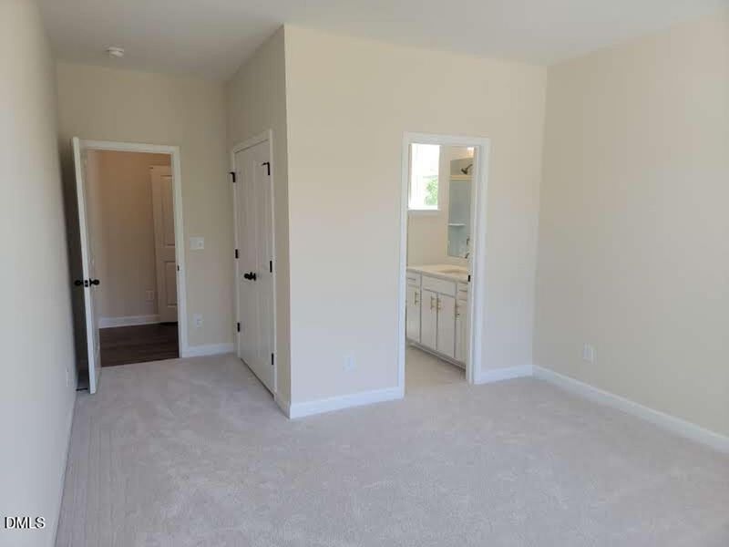 Spacious, unfurnished interior of a new home in Tobacco Road, Angier (Image 28).