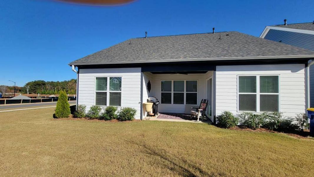 Exterior details and patio area of a home in The Reserve at Bells Ferry, Kennesaw (Image 36).