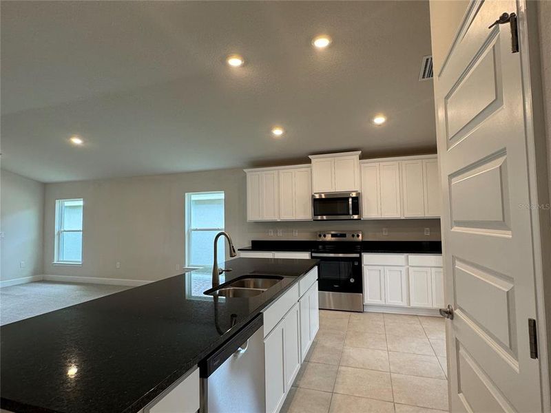 Furnished interior view inside a new home in Harmony Central, Harmony (Image 4).