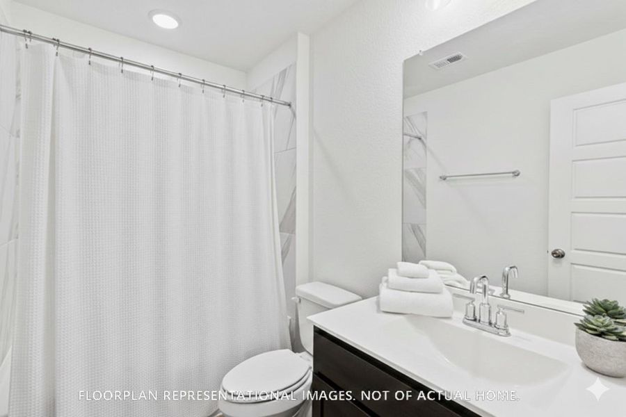 Furnished interior view inside a new home in Lone Star Landing, Montgomery (Image 11).