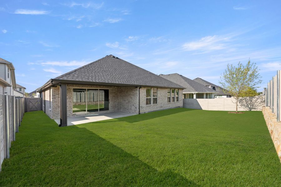 Exterior details and patio area of a home in Inspiration Collection 60 at Painted Tree, McKinney (Image 17). Exterior details and patio area of a home in Inspiration Collection 60 at Painted Tree, McKinney (Image 17).