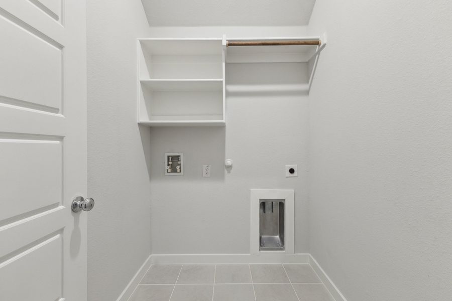 Utility room in the Quartz home plan by Trophy Signature Homes – REPRESENTATIVE PHOTO