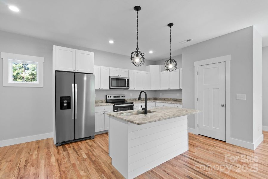 Furnished interior view inside a new home in , Asheville (Image 17).