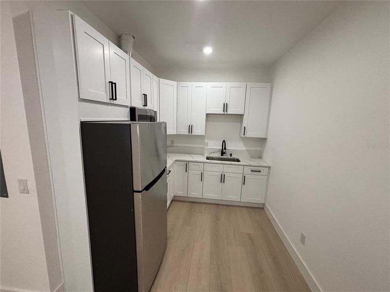 Furnished interior view inside a new home in , Brooksville (Image 8).