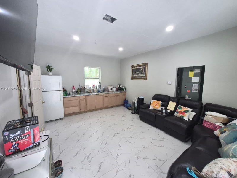 Furnished interior view inside a new home in , Clewiston (Image 9).