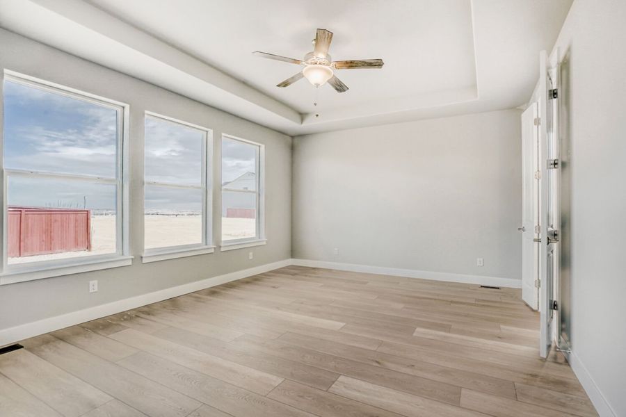 Spacious, unfurnished interior of a new home in RainDance, Windsor (Image 18).